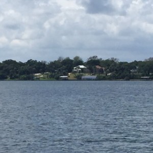 This shot taken from the center of the waterway gives you an idea of how wide the waters here are. I also noticed that the land here is more elevated than we've seen before. Some of the houses look like they are built on hills.